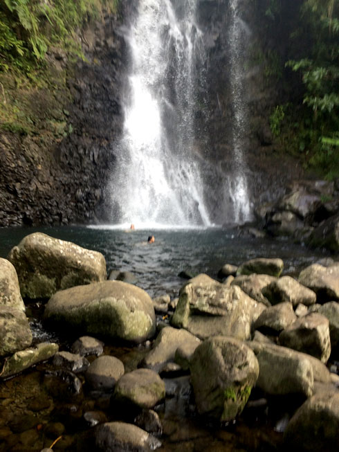 Swimming at a waterfall (that's me under the spray...)